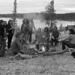 Charles Overvold, James Wah-shee, Bea Goldney (St. Arneault), Tapwe Chretien, Gail Cyr, George Erasmus, Richard Cadieux, Gina Blondin, Mel Watkins, Rick Hardy, Peter Puxley, and Gerald Sutton. Indian Brotherhood of the NWT strategy meeting at Consolation Lake, 1974.