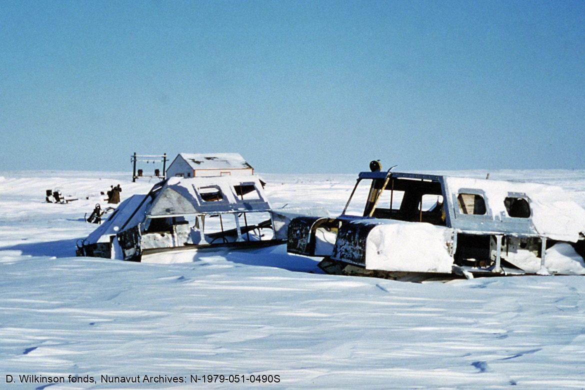 Old Operation Muskox vehicles, Baker Lake settlement, 1957.
